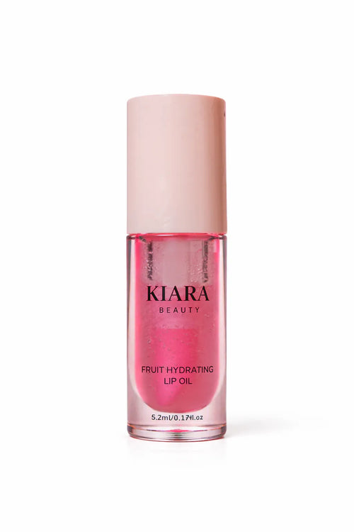 Pink lip oil bottle with 'Kiara Beauty' branding on a white background