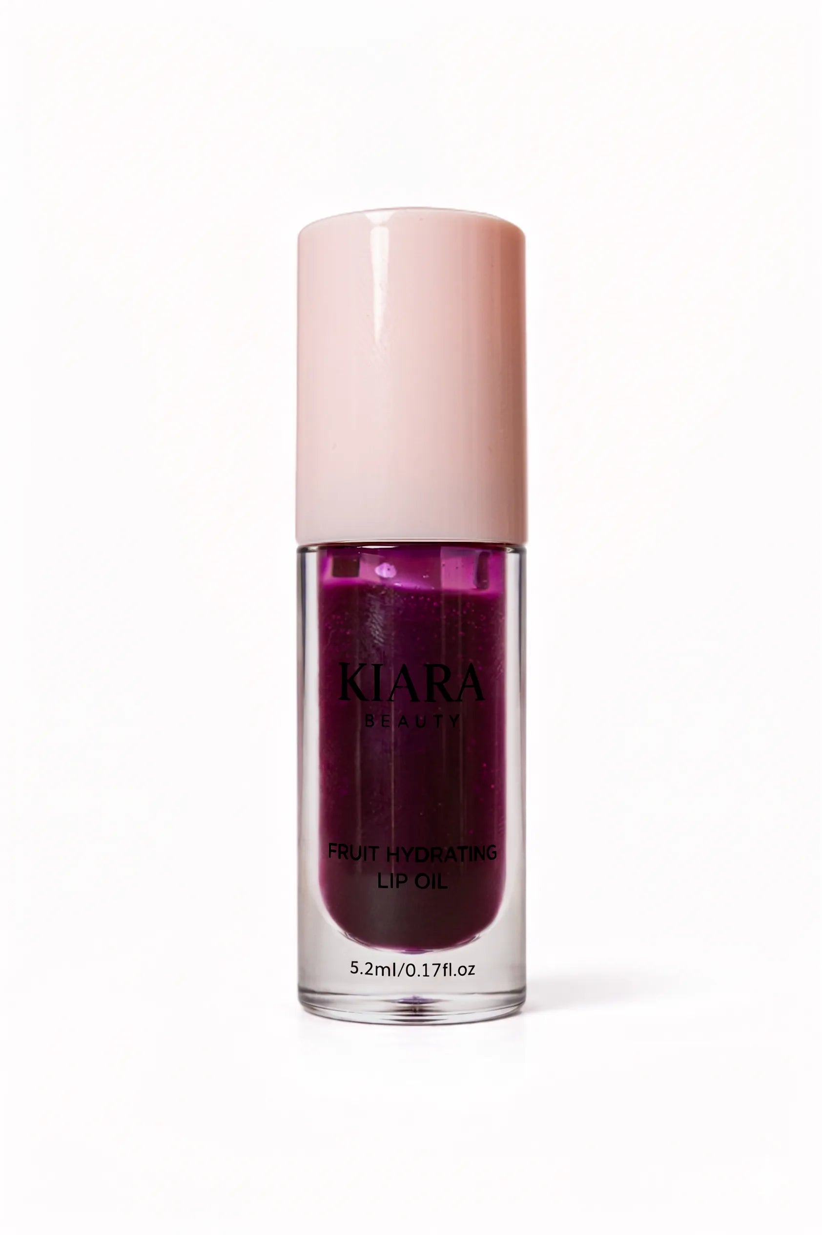 Kiara Beauty lip oil with pink cap on a white background