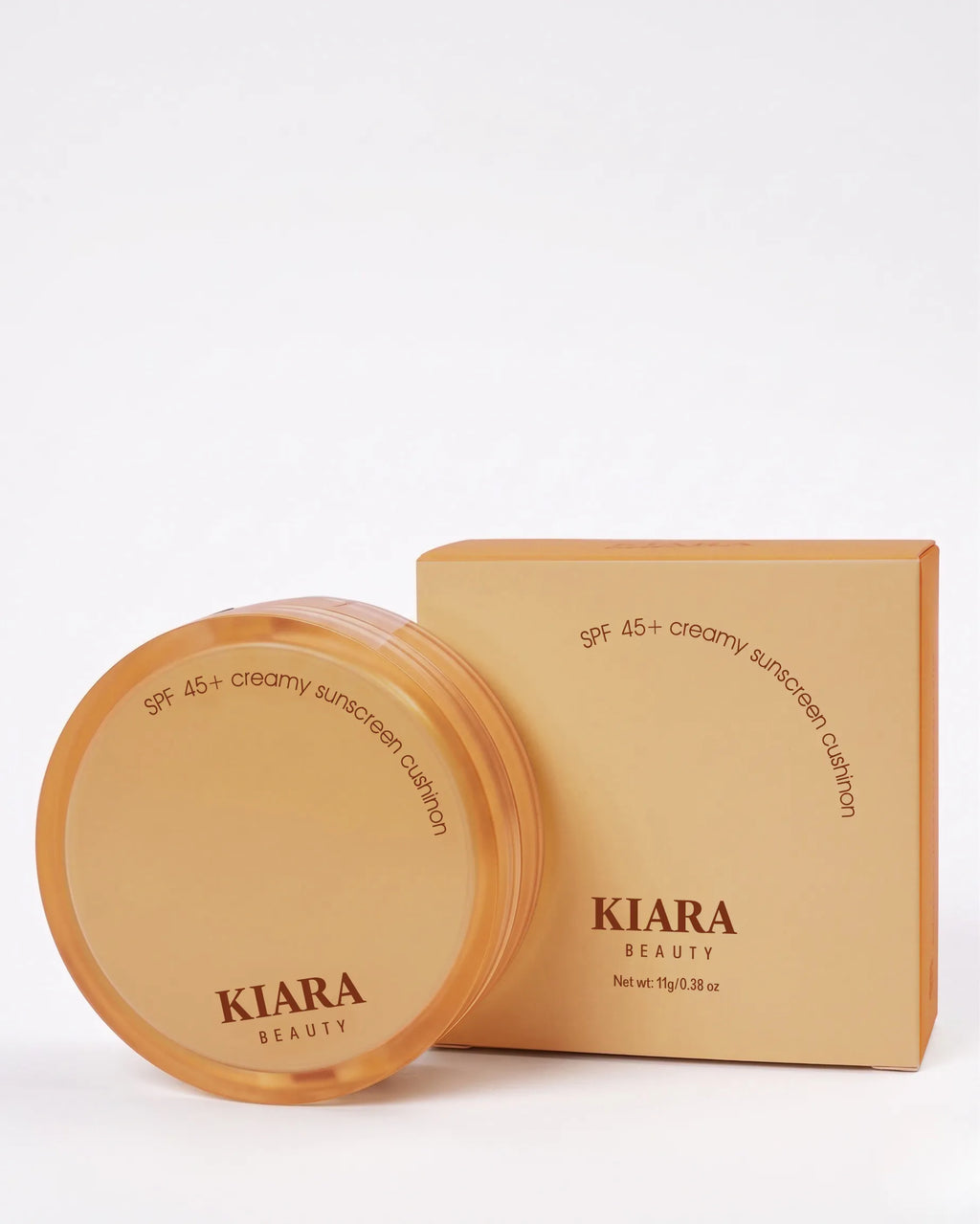 Kiara Beauty sunscreen container and packaging on a white background